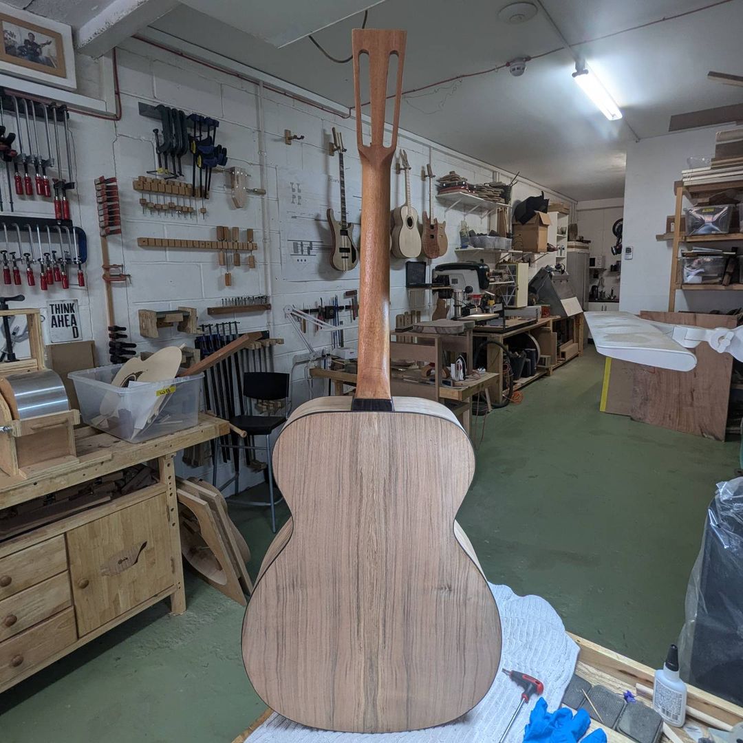 First coat of #shellac on the neck, after what appears to be aeons of #sanding  #xylonguitargallery #xylonguitars #lutherie #...